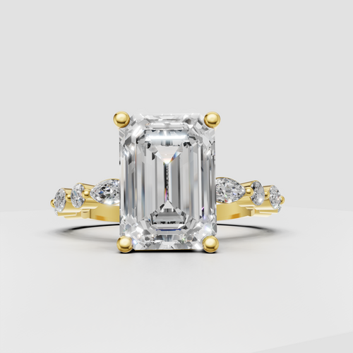 Emerald cut diamond cathedral engagement ring in polished yellow gold