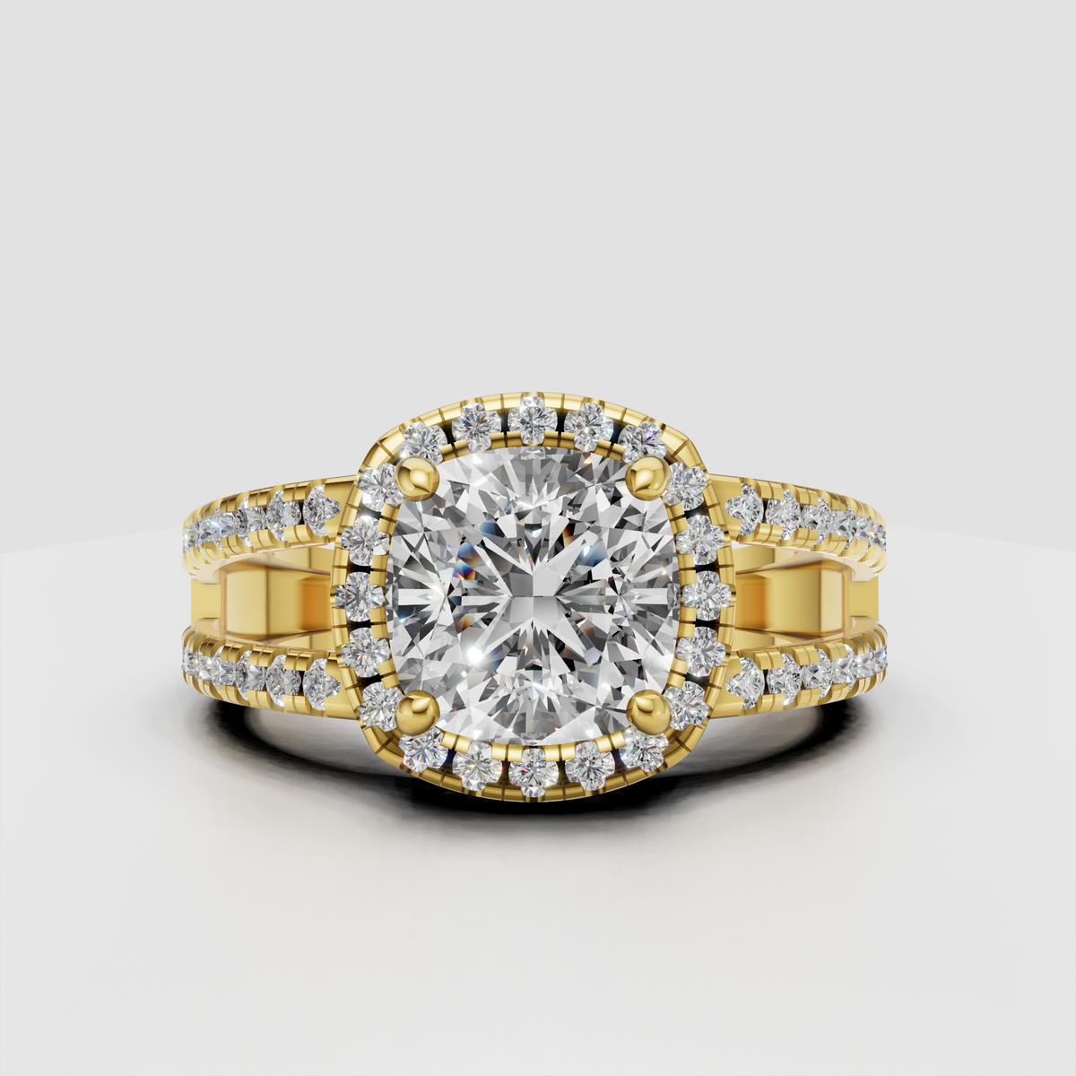 Cushion cut diamond halo engagement ring in yellow gold