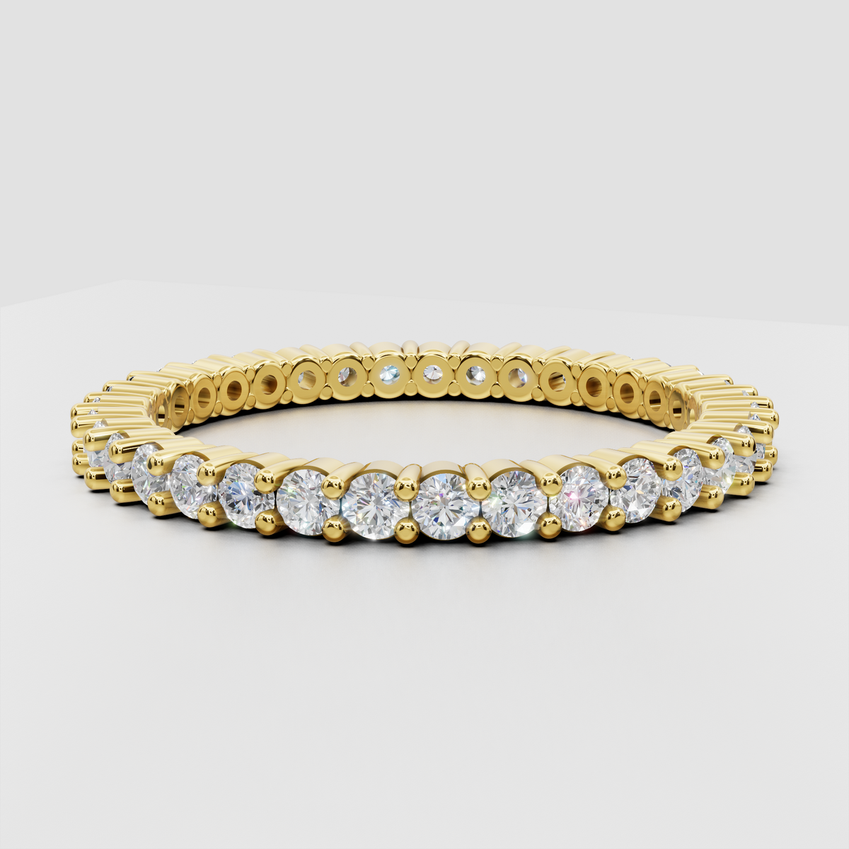 Oval diamond cathedral pavé engagement ring in polished yellow gold
