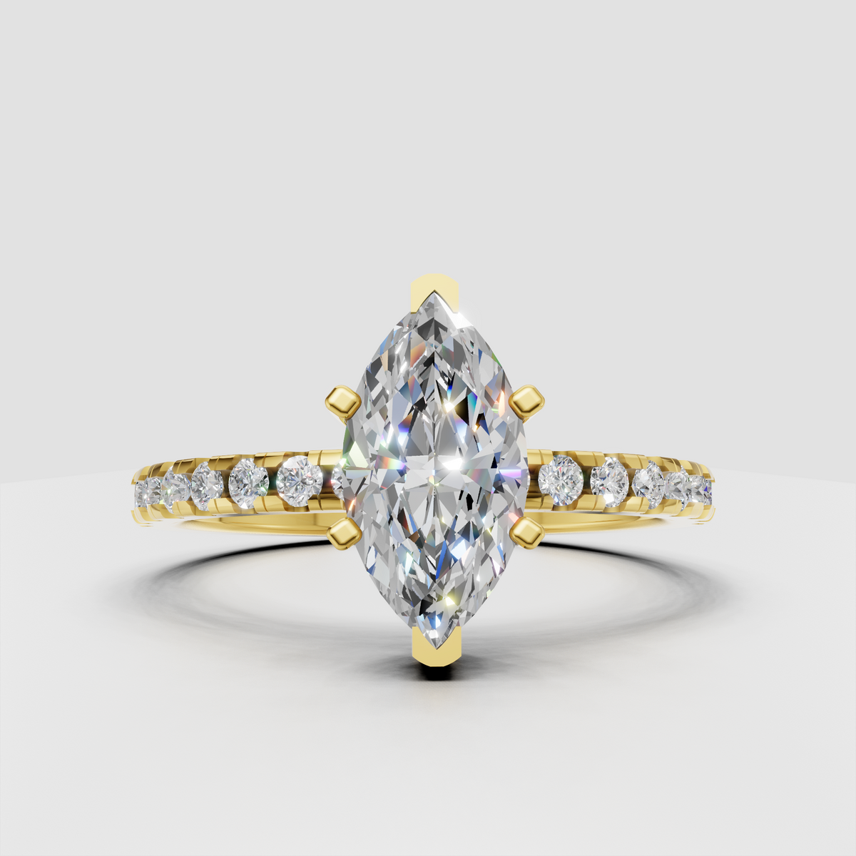 Marquise diamond pavé cathedral solitaire engagement ring in yellow gold