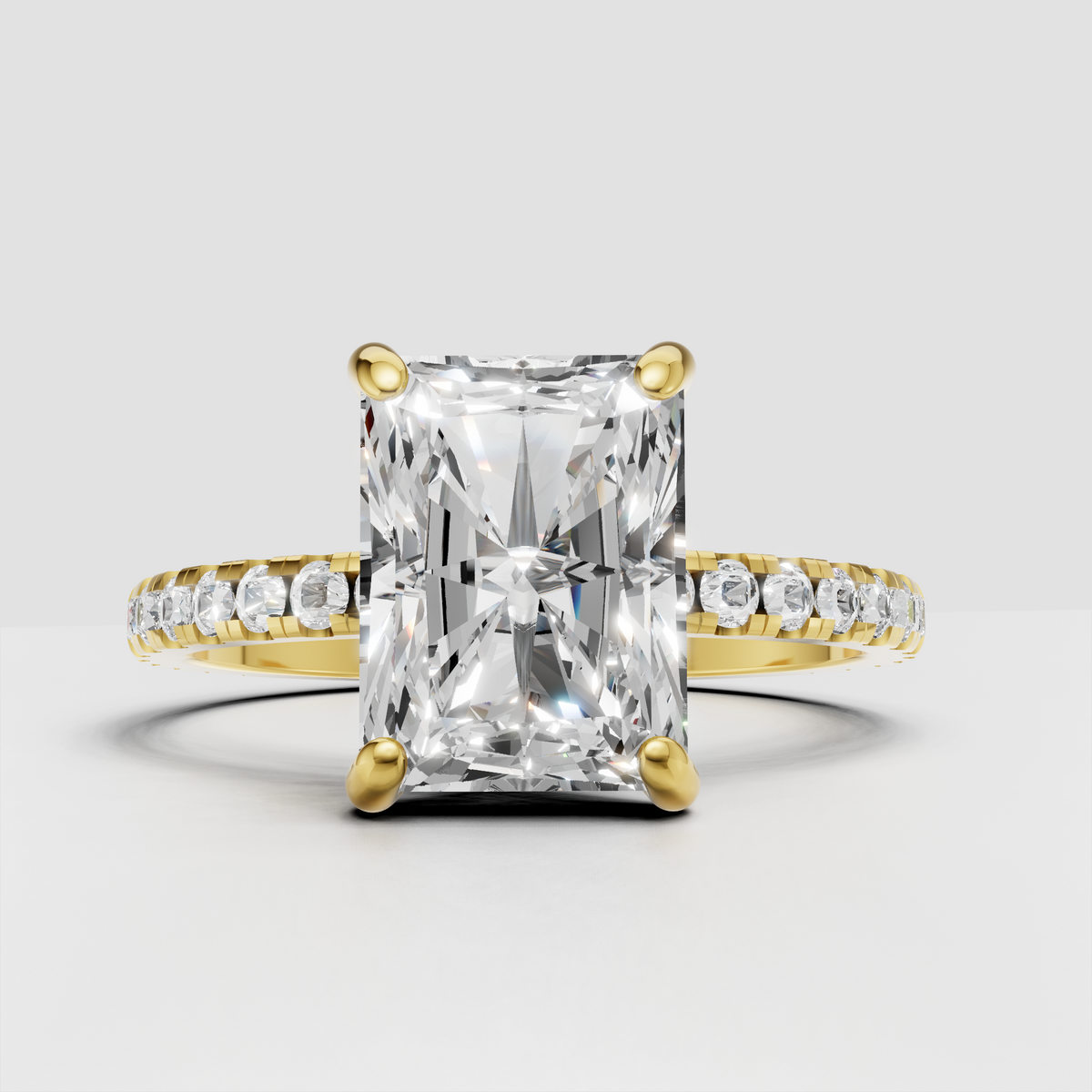 Radiant cut diamond solitaire engagement ring with slim pave band