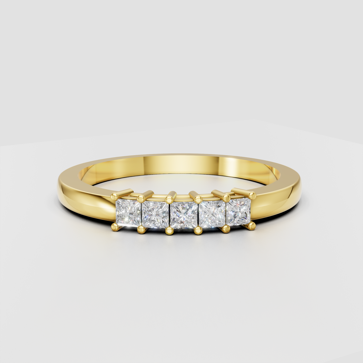 Princess cut diamond five-stone ring in polished yellow gold with shared-prong setting