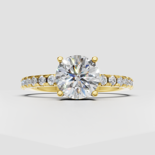  Round cut diamond three stone engagement ring in yellow gold