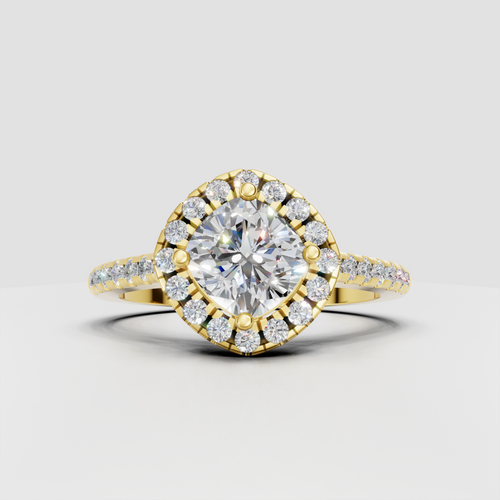 Cushion cut diamond halo engagement ring with yellow gold cathedral setting
