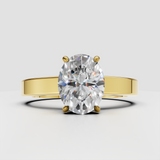 Oval solitaire diamond engagement ring in yellow gold