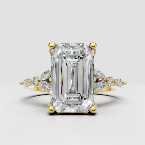 Emerald cut split shank diamond ring in yellow gold