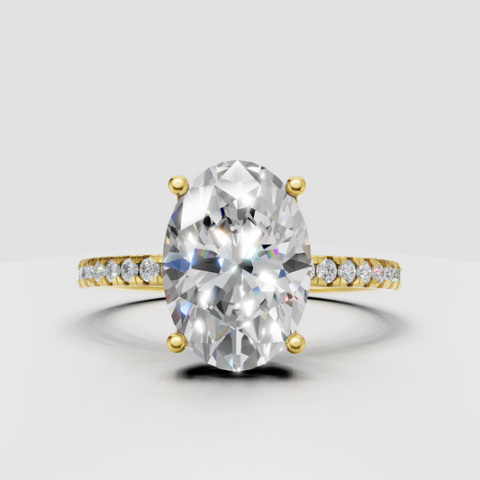 Oval diamond cathedral pavé engagement ring in polished yellow gold