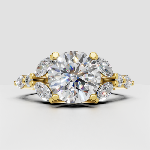 Round diamond cluster engagement ring with marquise side stones in polished yellow gold