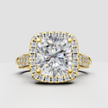 Cushion diamond halo pavé engagement ring in polished yellow gold