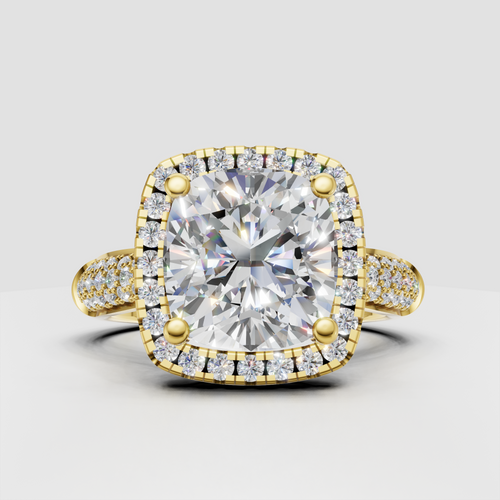 Cushion diamond halo pavé engagement ring in polished yellow gold