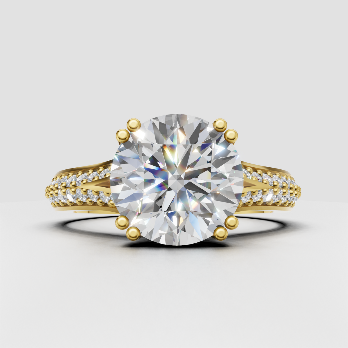 Round Cut Diamond engagement ring with micro pavé bead-set band in polished yellow gold