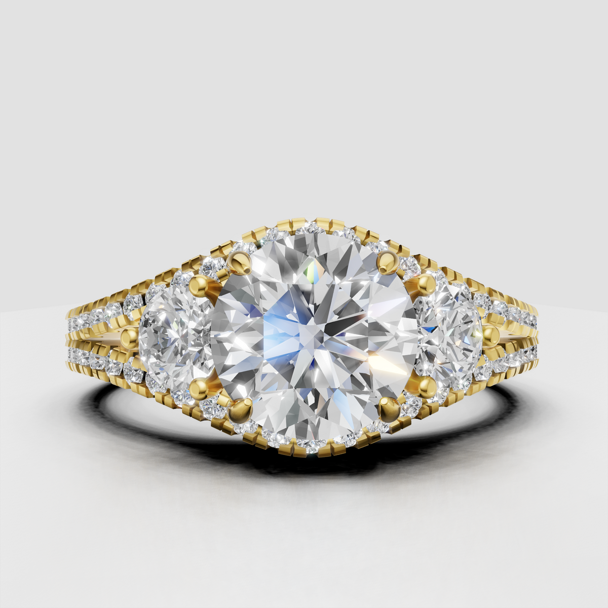 Round cut diamond three stone engagement ring with double halo