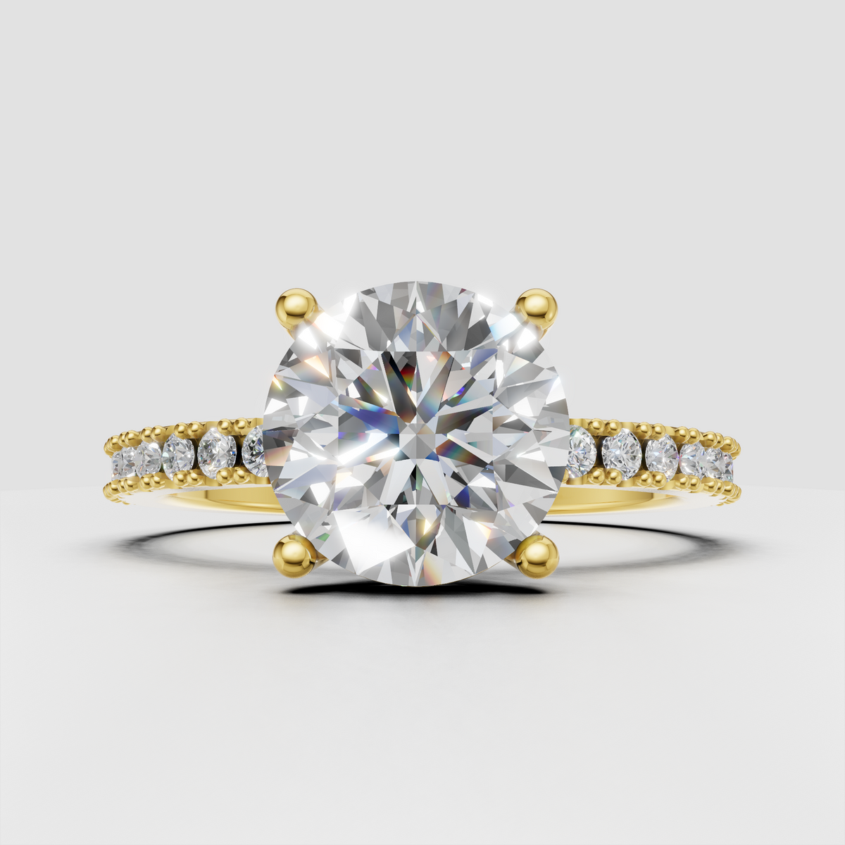 Oval diamond engagement ring with pave round side stones and milgrain detailing