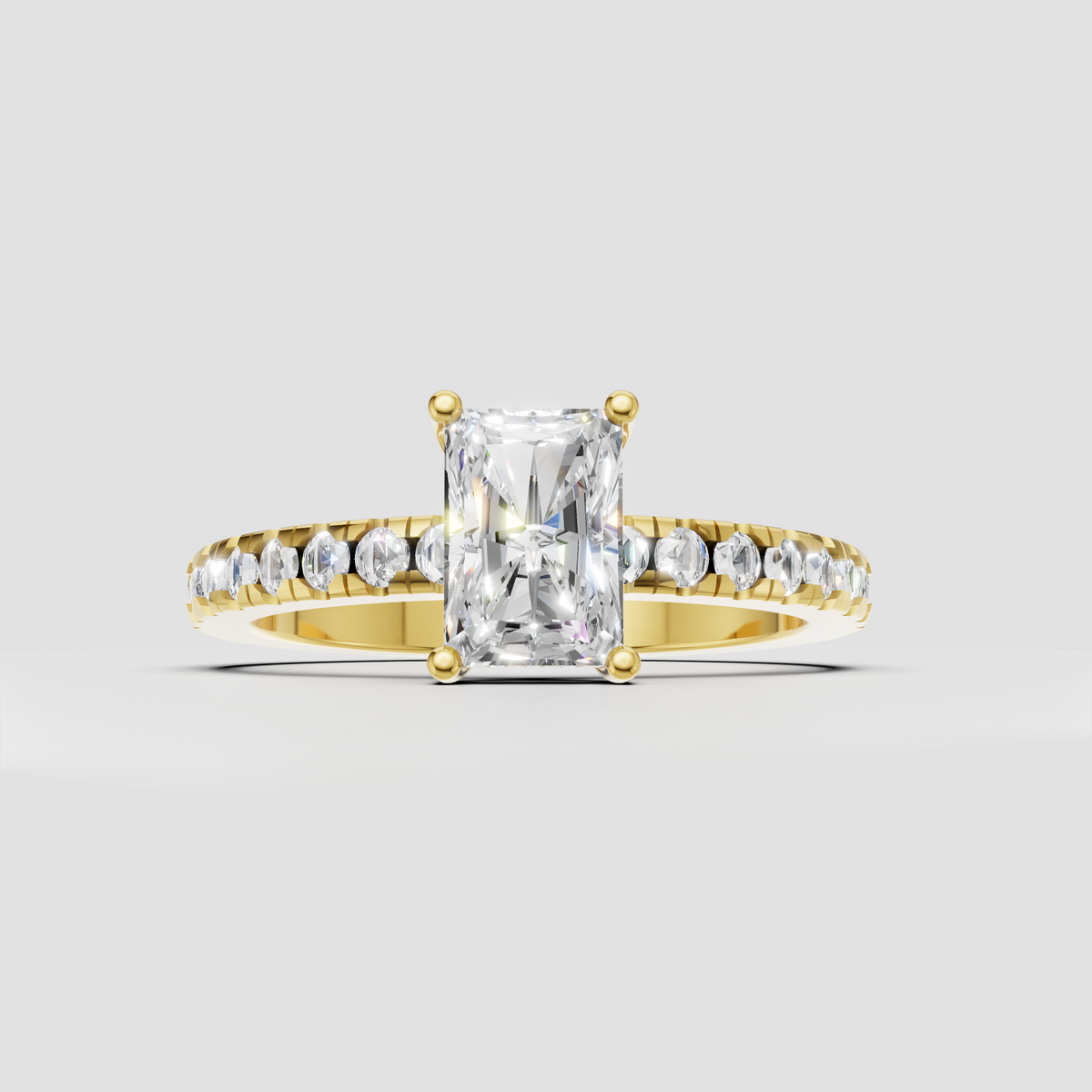 Radiant cut Diamond four-prong pavé engagement ring in yellow gold