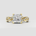Princess cut diamond four-prong split shank engagement ring in yellow gold