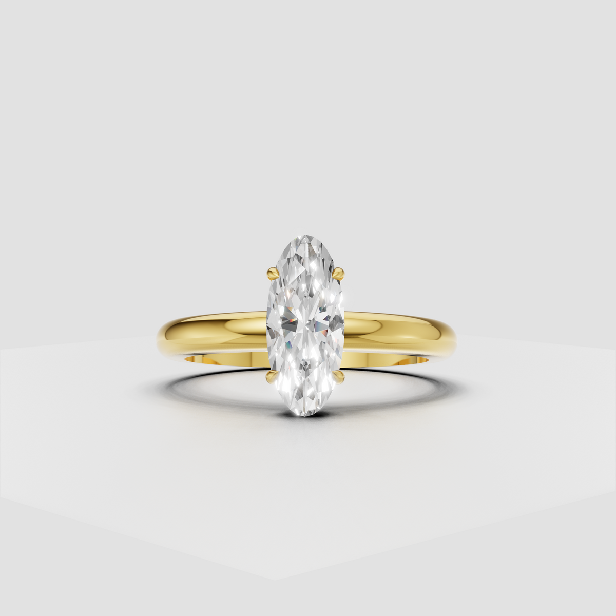 Oval diamond four-prong solitaire engagement ring in polished yellow gold