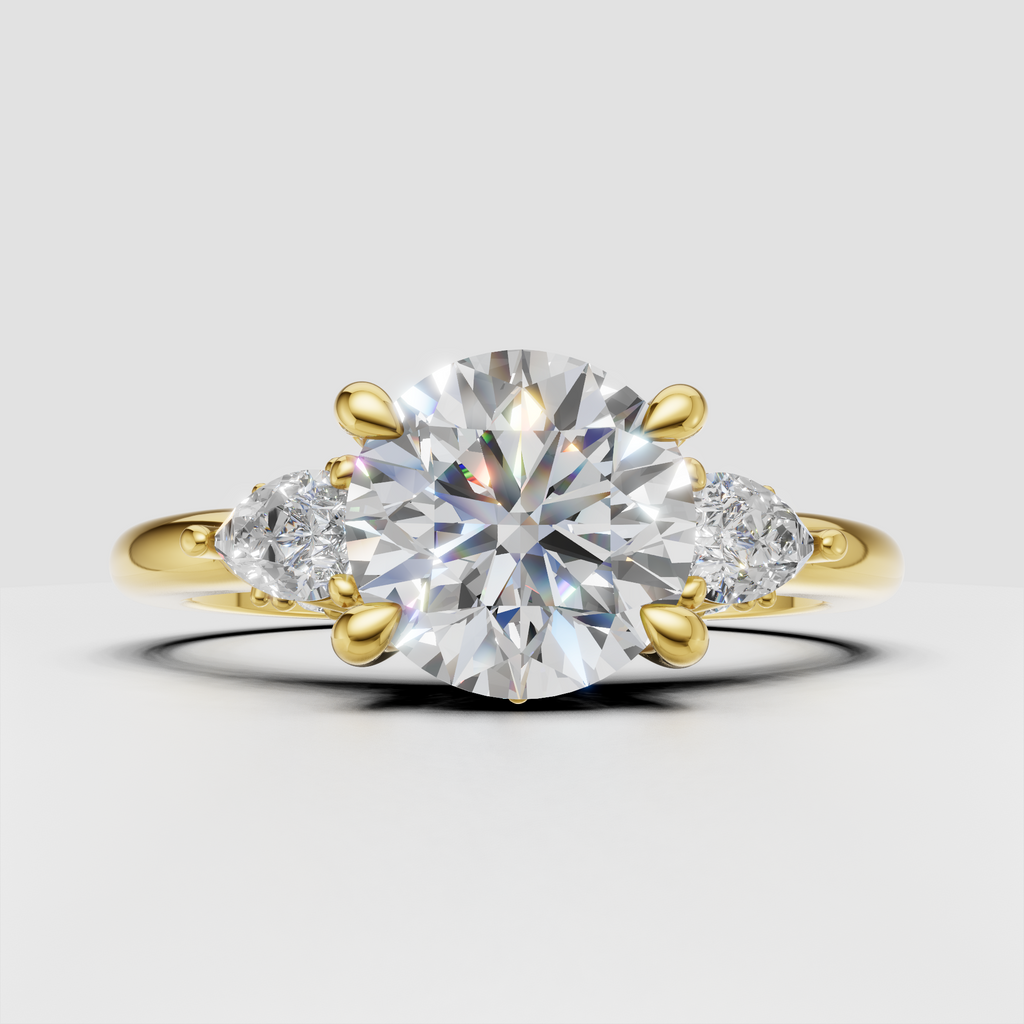 Round diamond three stone floral prong setting engagement ring in yellow gold