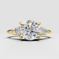 Round diamond three stone floral prong setting engagement ring in yellow gold