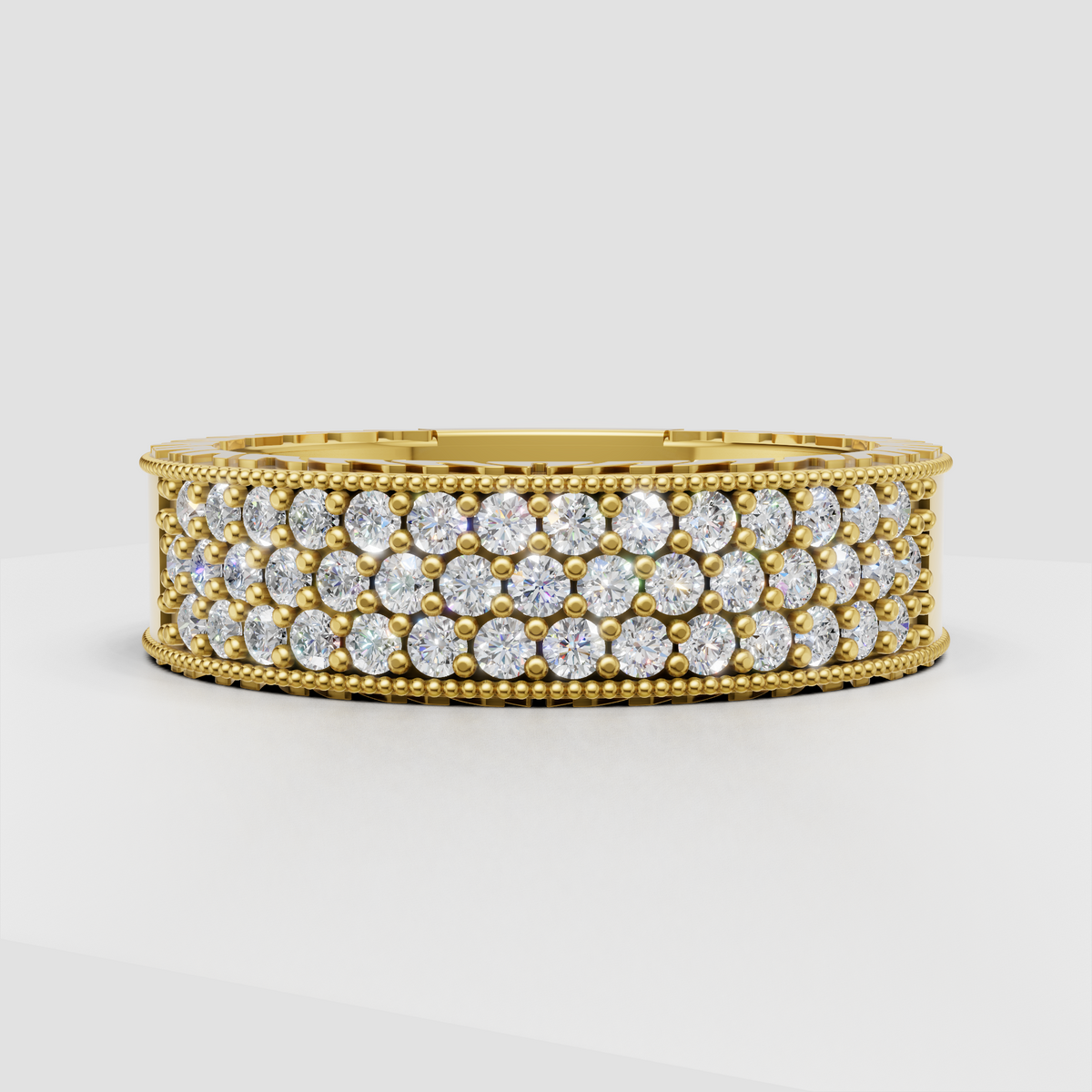 Round diamond three-row pavé band ring in polished yellow gold