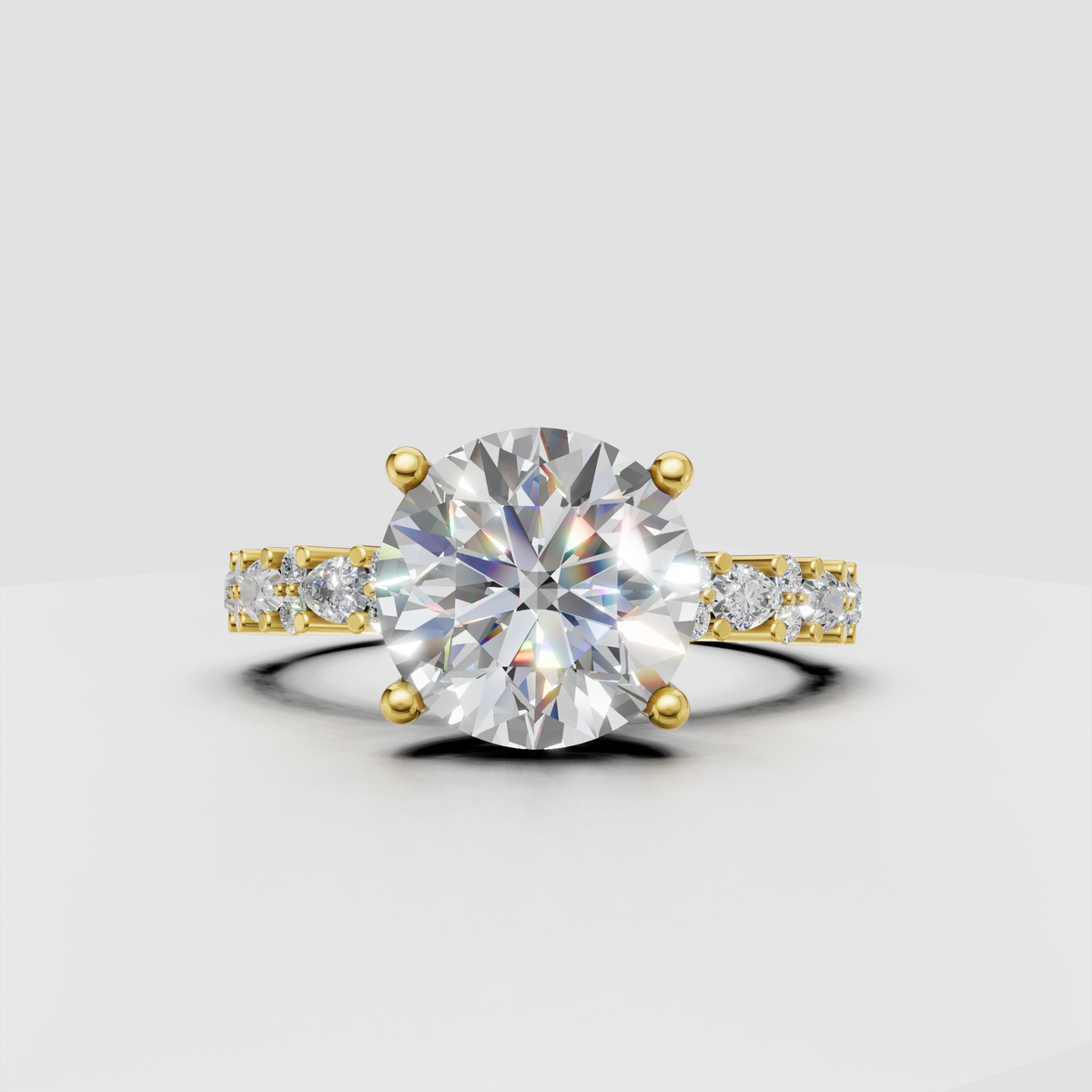 Round diamond prong solitaire engagement ring with accent diamonds