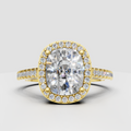 Oval diamond halo engagement ring with sparkling pave band
