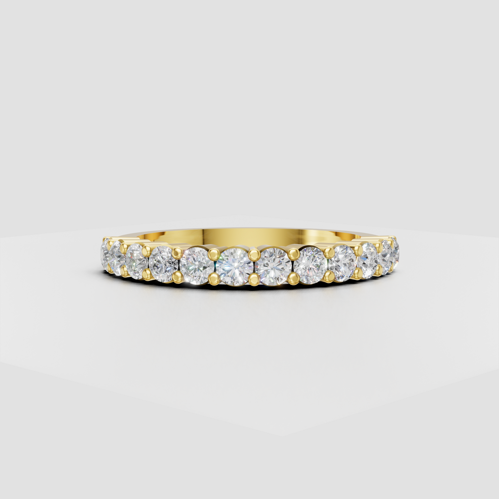 Round diamond eternity band in polished yellow gold with bead-set detailing  
