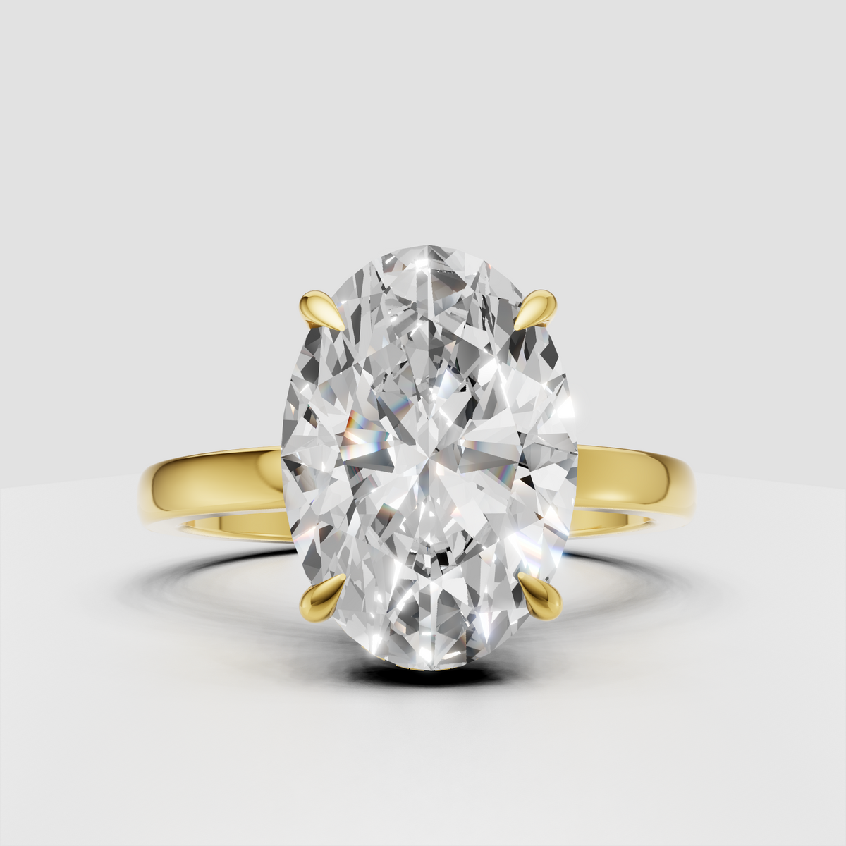 Oval cut diamond engagement ring in yellow gold