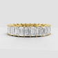 Emerald cut diamond eternity band in polished yellow gold