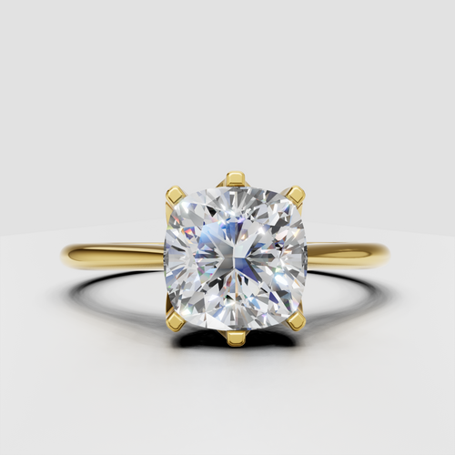 Cushion-cut diamond six-prong cathedral engagement ring in yellow gold