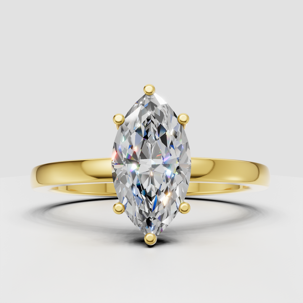 Marquise cut diamond engagement ring in yellow gold