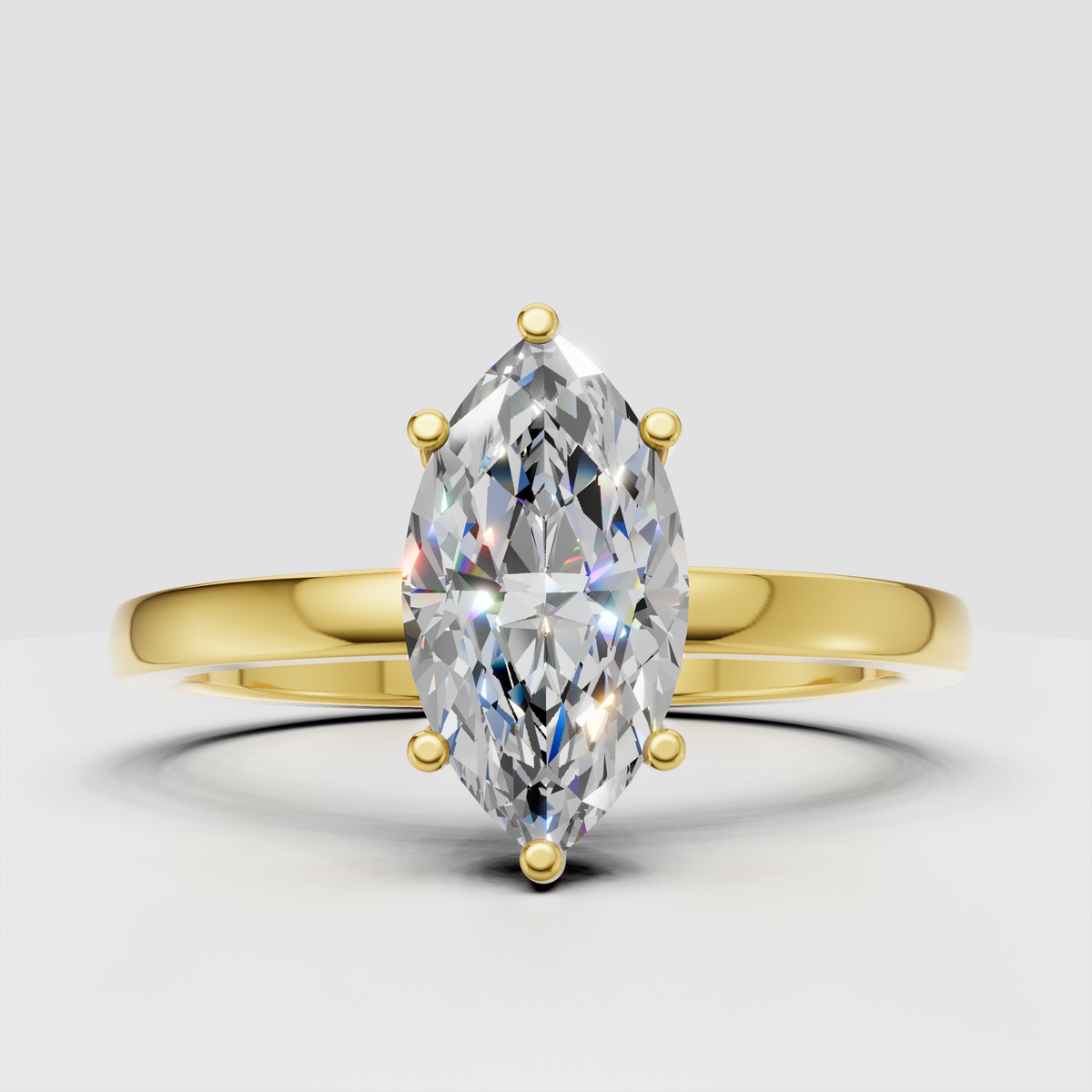 Marquise cut diamond engagement ring in yellow gold