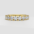 Round diamond full eternity band with shared prong setting in polished metal
