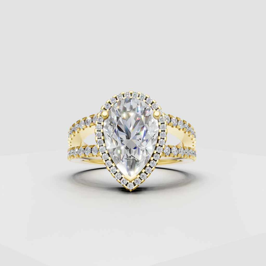 Pear cut diamond halo engagement ring with split-shank pavé band
