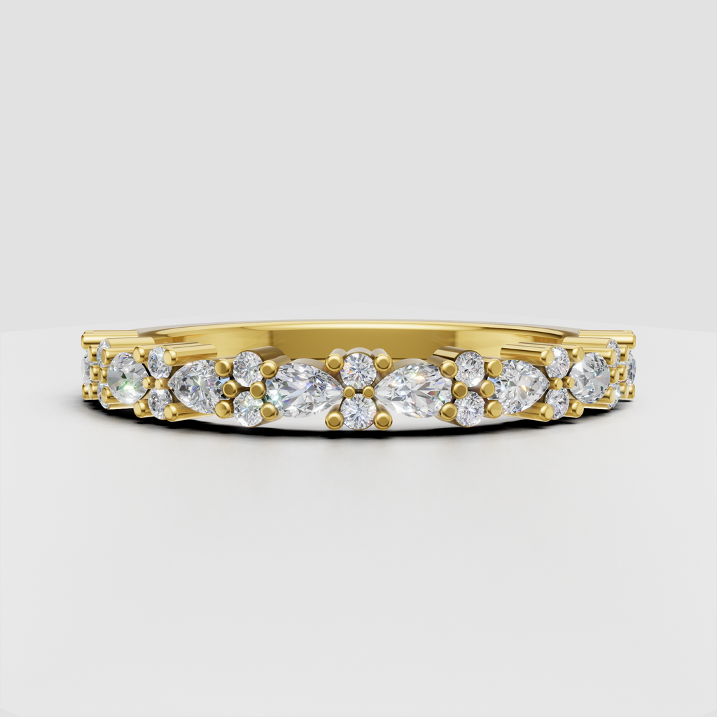 Round and pear cut diamond wedding band in polished yellow gold