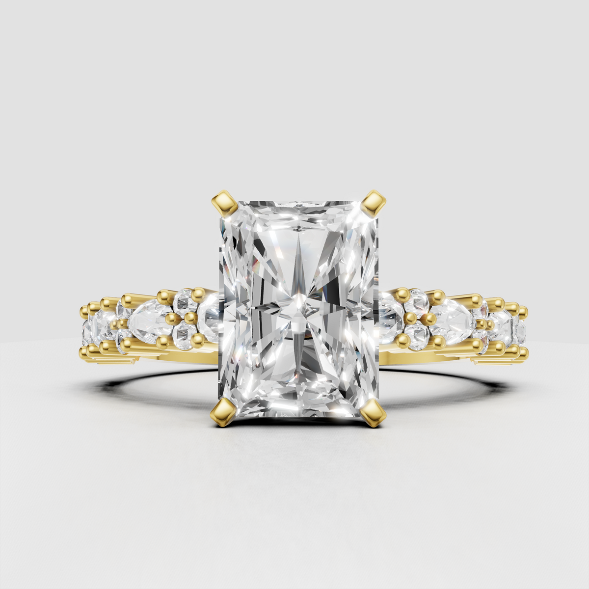 Radiant cut diamond cathedral engagement ring with side stones