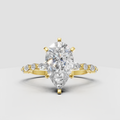 Marquise cut diamond solitaire engagement ring in yellow gold