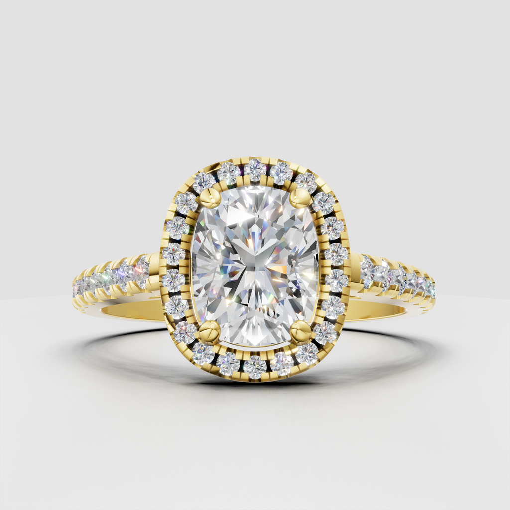 Cushion cut diamond halo engagement ring in yellow gold