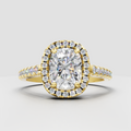 Cushion cut diamond halo engagement ring in yellow gold