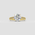 Round cut diamond vintage style ring in polished yellow gold