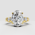 Oval diamond cathedral five stone engagement ring with graduated round side stones