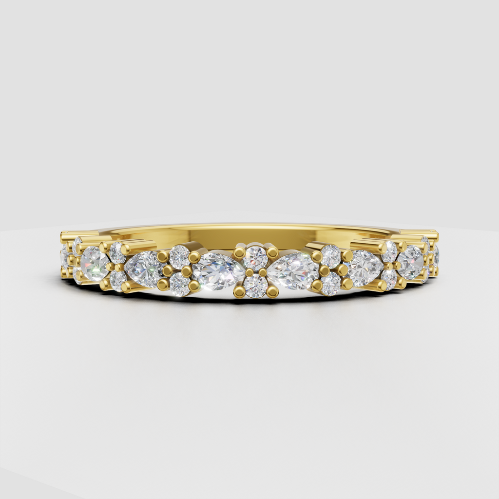Pear cut diamond half eternity band in yellow gold