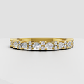 Pear cut diamond half eternity band in yellow gold