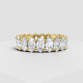 Oval diamond shared prong eternity ring in polished metal