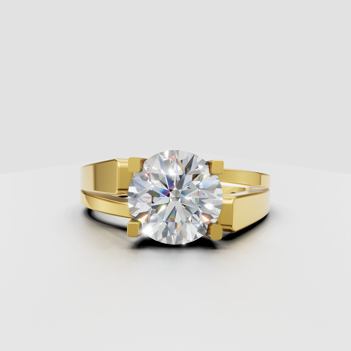 Round cut diamond engagement ring with four-prong yellow gold setting