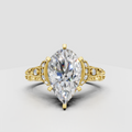 Pear cut diamond vintage filigree halo engagement ring in yellow gold
