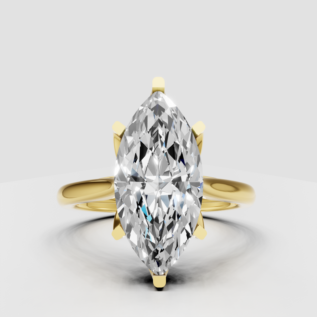 Marquise cut diamond split shank cathedral engagement ring in yellow gold