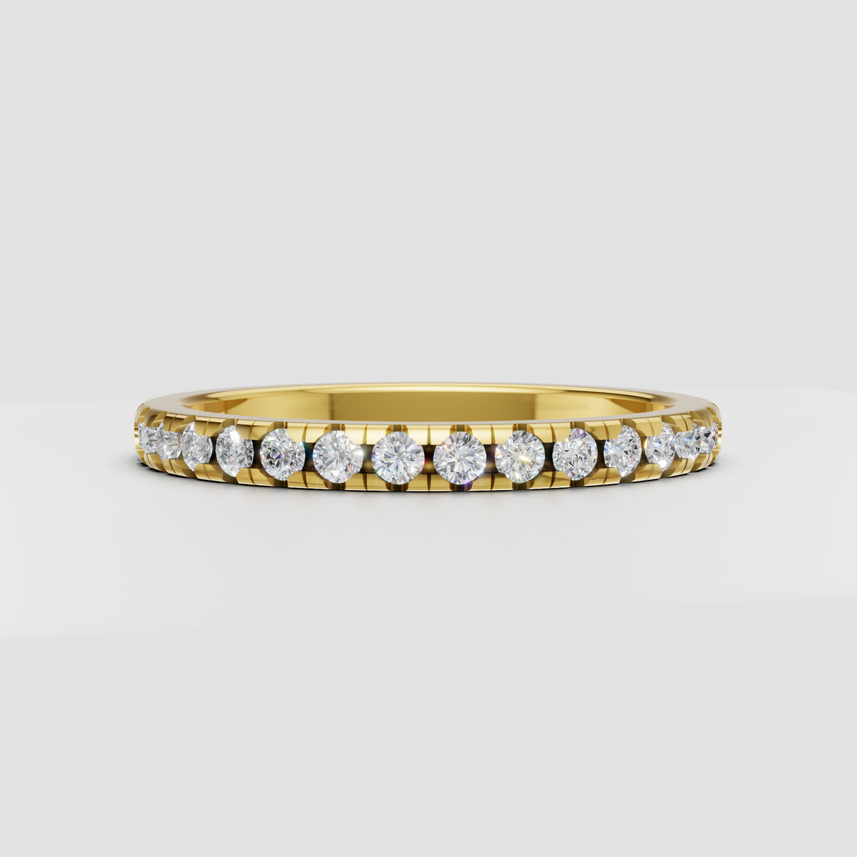 Round diamond eternity band with shared prong setting