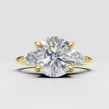 Round diamond three-stone nature inspired engagement ring