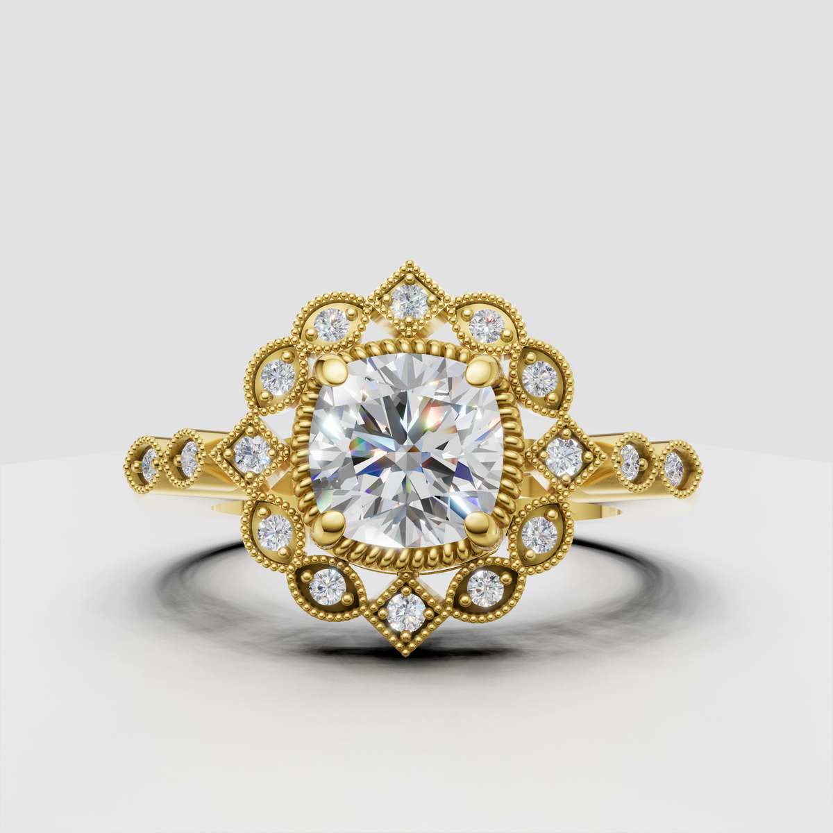Cushion cut diamond floral halo engagement ring in yellow gold