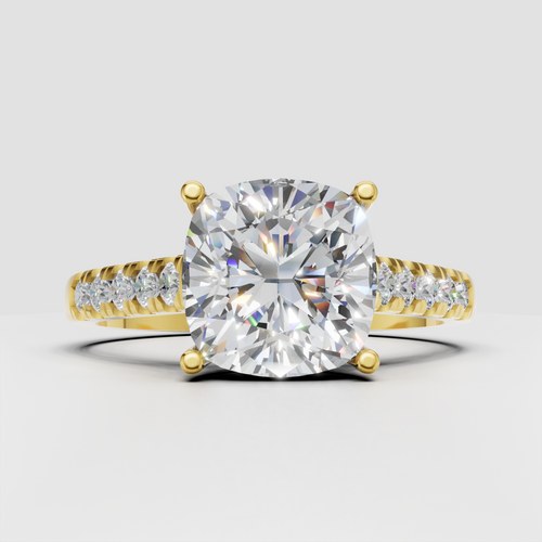 Cushion cut diamond engagement ring in yellow gold